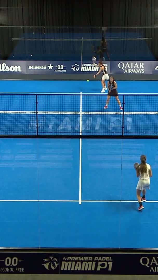 Araujo rushes to the net for another powerful smash