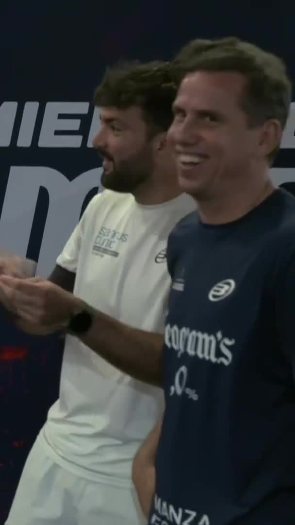 Navarro Laughs During the Warm-Up