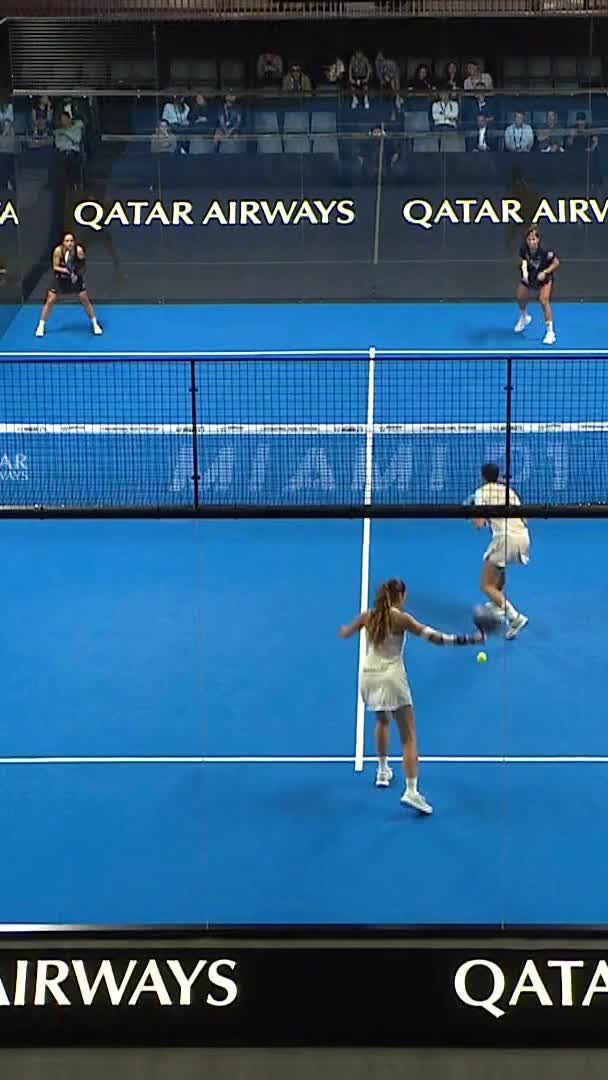 Excellent cross-court backhand by Bea over the net